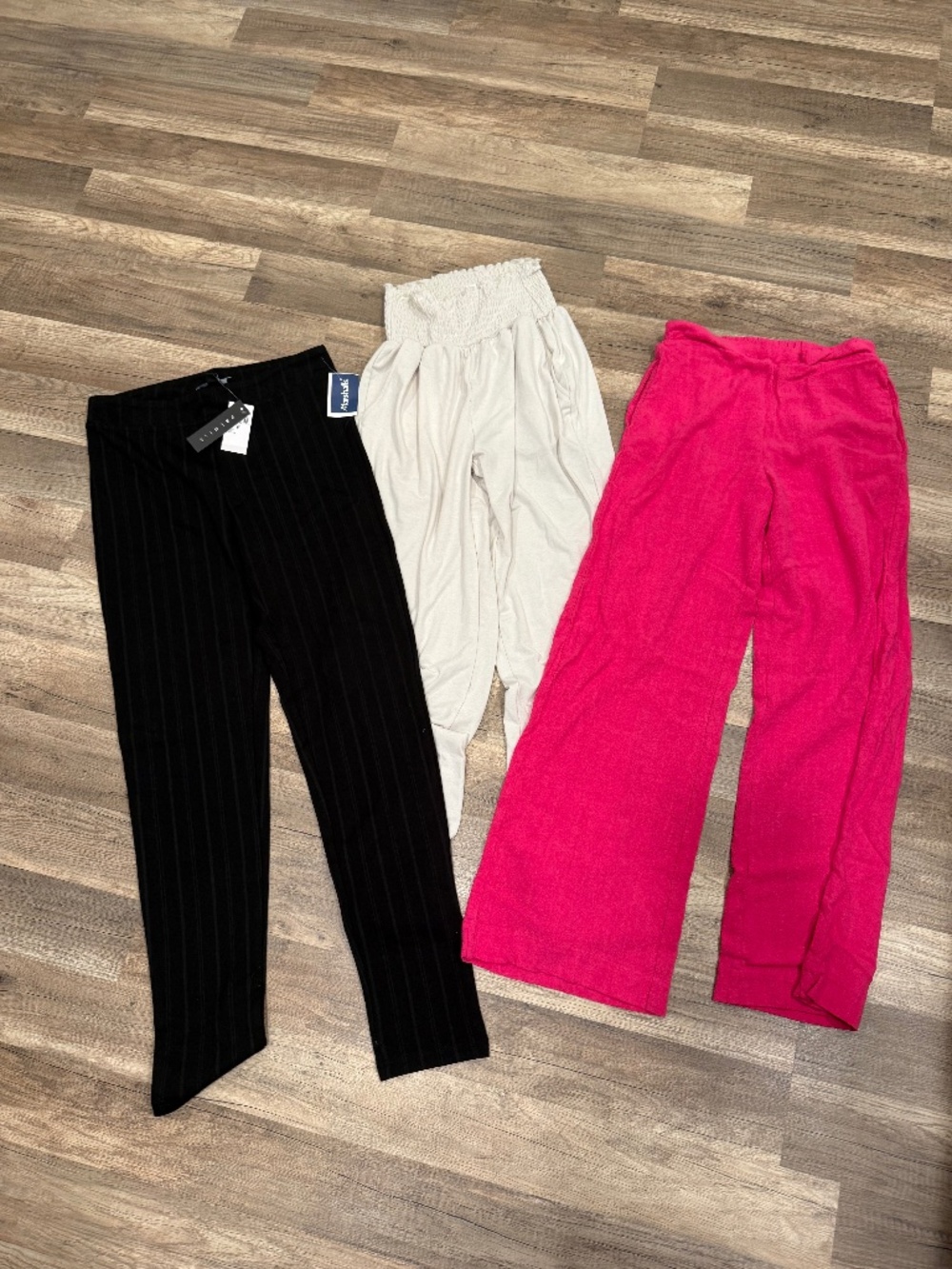 A lot of three size small pants